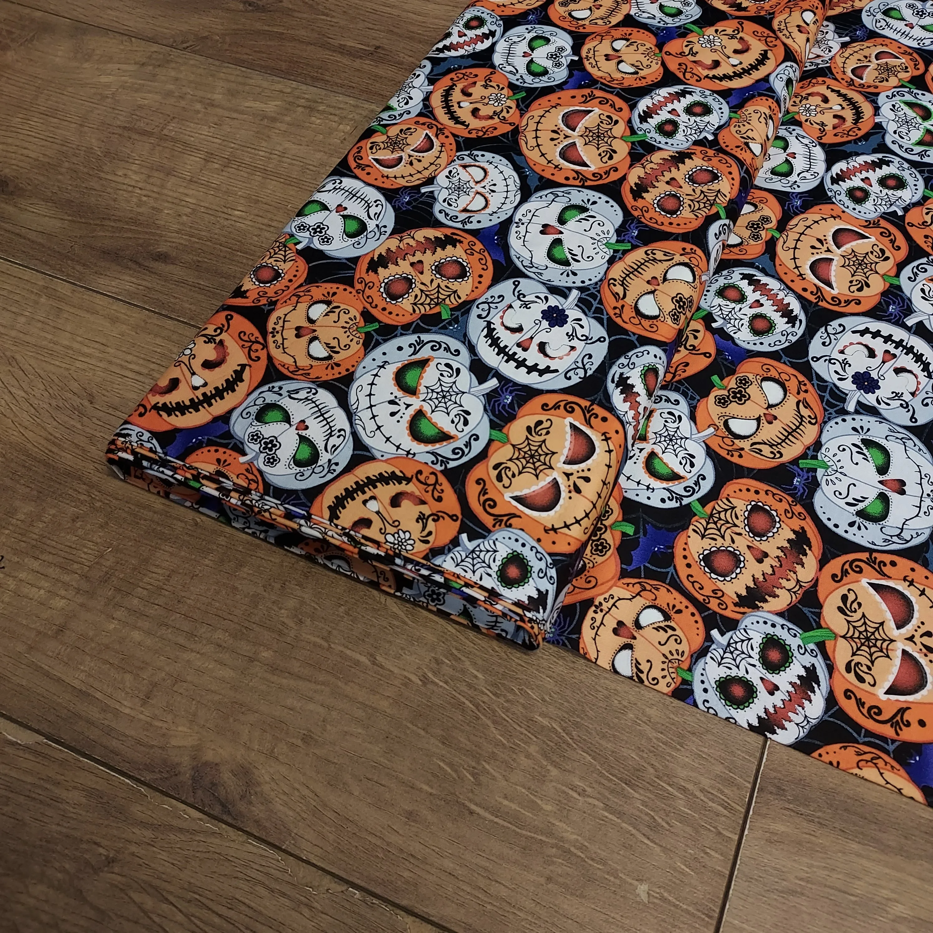 Timeless Treasures Wicked Sugar Skull Pumpkins Glow in the Dark Cotton Fabric